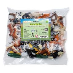 small plastic figurines are in a bag on a white background with the label