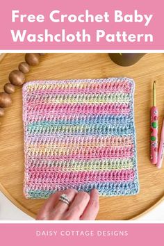 a crochet baby washcloth pattern on a wooden table with pink and green accents