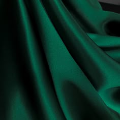 Hunter Green Pure Mulberry Silk Fabric Width 44 inch (112 cm), Industry Thickness : 19 m/m (Momme) Content: 100% Pure Silk Silk Charmeuse Fabric possesses not only the finest aesthetics, but retains the fluid sophistication most sought after in silk fabrics. At the top of its class, Charmeuse Fabric is a satin weave that allows this fabric to retain a soft feel and supple drape that most high-end designers crave, this fabric has many applications as it is composed of both a shiny face on one sid Green Silk Curtains, Luxury Silk Fabric For Formal Occasions, Emerald Green Silk Fabric, Deep Green Fabric, Silk Colors Fabrics, Green Fabric Aesthetic, Green Silk Wallpaper, Green Silk Suit, Emerald Green Color Palette