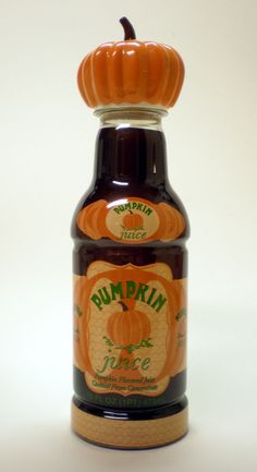 a bottle of pumpkin syrup on a white background