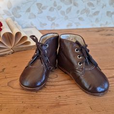 Vintage leather baby shoes with original shoe laces from the 1970s. ✔️Size, approximately 22 EU// 5 1/2 - 6 US // 5 - 5 2 1/2 UK ✔️Dimensions, approximately: inner footbed 13.5 cm (5.3 inches), height at the heel from the inside 7 cm (2.8 inches) ✅ Do you like this one? Look at something more in my store: 👉 https://etsy.me/2HNEoq1 (farmhouse decor) 👉 https://etsy.me/3do62rH (vintage goods) 👉 https://etsy.me/35UUWVy (craft supplies) PLEASE NOTE 📌This is a vintage and old item (are not new and have signs of wear) and sold in the "as is" condition. Please look at all the photos carefully! Photography is part of the description. 📌As different computers display colors differently, the color of the actual item may vary slightly from the images, thanks for your understanding. 📌 If You choos Leather Baby Shoes, Shoes Vintage, Leather Baby, The 1970s, Vintage Shoes, Vintage Leather, Kid Shoes, Shoe Laces, Kids Shoes