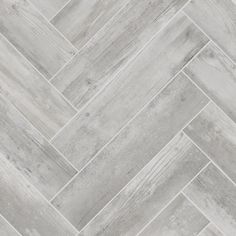 a white tile floor with grey wood planks on it's sides and the top section