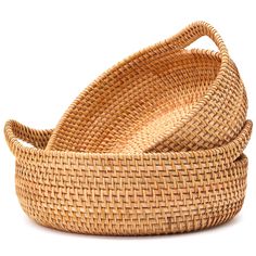 two woven baskets sitting on top of each other