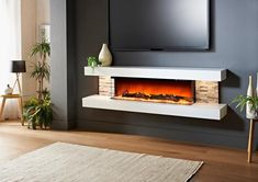 a living room with a flat screen tv on the wall and a fire in the fireplace