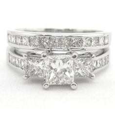 three pieces of white gold with princess cut diamonds on each side and channel set in the middle