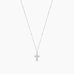 Stay in touch with your spiritual side with our Isla Cross Necklace that radiates beauty and faith. Exquisitely expressive with a touch of glimmer, you’ll feel connected and confident whenever it’s close to your heart. - Gold plating over Sterling Silver- Adjustable chain length from 16” to 19”- Pendant cross measures approx. 1/2” length and 1/4” width- Available in Gold and Silver Horizontal Cross Necklace, Cultured Pearl Necklace, Locket Charms, Jewelry Sterling Silver, Heart Locket, Locket Necklace, Gold And Silver, Gold Plating, Cross Pendant