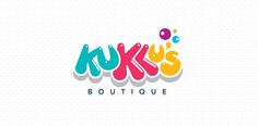 the logo for kuki's boutique, which has been designed to look like it is