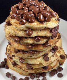 a stack of pancakes with chocolate chips on top