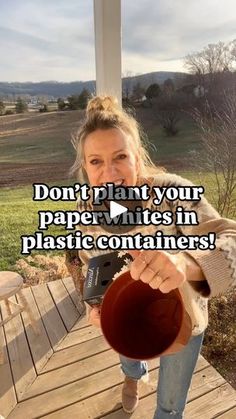 a woman is holding a cup with the words don't plant your paper mitts in plastic containers