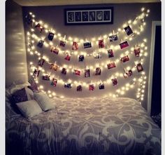 a bed with lights and pictures on it