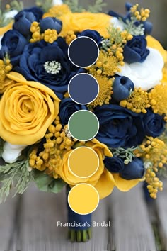 a bridal bouquet with yellow and blue flowers, greenery, and other colors