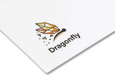 the dragonfly logo is on top of a white paper with an orange and yellow design