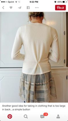 the back of a woman's sweater is shown in an instagramtion photo