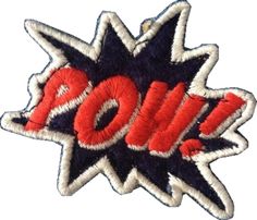 an embroidered patch with the word pow in red, white and blue letters on it