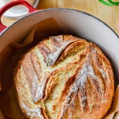 a loaf of bread sitting in a pan on top of a table