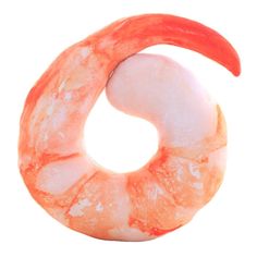 an orange and white doughnut shaped like the letter c