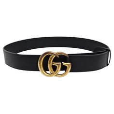 Introducing the Gucci Marmont Belt, an embodiment of luxury and timeless style. Crafted from genuine black leather, this exquisite accessory features the iconic GG logo buckle in antique brass, adding a touch of sophistication to any outfit. The meticulous design and superior craftsmanship reflect Gucci's dedication to quality and elegance. Perfect for both casual and formal occasions, this belt is versatile and stylish, making it a must-have addition to your wardrobe. Elevate your fashion game with the Gucci Marmont Belt, where classic design meets modern flair. This belt is a wardrobe essential that effortlessly enhances any outfit. The versatile black leather pairs seamlessly with a wide range of styles, making it the ideal choice for any occasion. Wear it in countless ways – cinch it a Gucci Marmont Belt, Gucci Brand, Gucci Marmont, Gucci Outfits, Pink Monogram, Gucci Tote, Gg Logo, Black Leather Belt, Belt Black