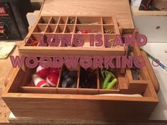 a wooden box filled with lots of different items