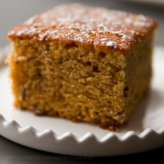 a piece of cake sitting on top of a white plate