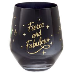 a wine glass with the words fierce and fabulous painted on it's side in gold lettering