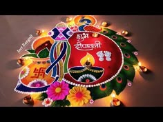 happy diwali greeting card with colorful flowers and candles