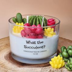 a candle that has some flowers in it