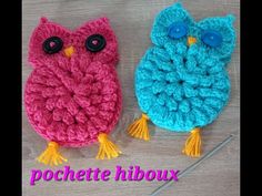 two crocheted owls sitting next to each other