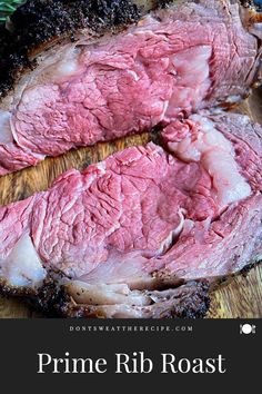 prime rib roast on a wooden cutting board with the words prime rib roast above it