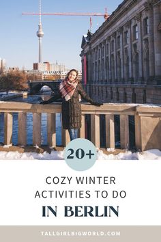 a woman standing on a bridge with the words 20 cozy winter activities to do in berlin