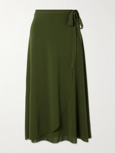 Eres' 'Julieta' wrap skirt is a chic way to cover up at a beachside lunch or pool bar. Made from comfortable stretch-jersey in a versatile army-green, it ties at the waist for a customized fit and falls to a floaty hem. Chic Wrap Maxi Skirt With Flowy Fit, Elegant Asymmetrical Beach Wrap Skirt, Elegant Flowy Wrap Skirt For Vacation, Elegant Wrap Skirt For Vacation, Chic 4-way Stretch Summer Skirt, Chic 4-way Stretch Skirt For Summer, Chic Green Draped Skirt For Summer, Green Wrap Skirt, Wrap Skirt Outfit