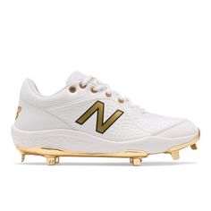 a white and gold new balance shoe