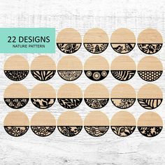 wooden circles with black and white designs on them, in the shape of an oval