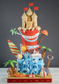 a birthday cake made to look like a beach scene