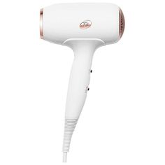 What it is: A tool that's 30 percent smaller than a traditional hair dryer and is powered by advanced IonAir technology for fast drying with smooth, shiny results.Hair Type: Straight, Wavy, Curly, and CoilyHair Texture: Fine, Medium, and ThickHair Concerns:- Frizz- Shine- Volumizing Key Benefits: - T3 IonAir technology has a wide, ion-infused airstream that dries hair gently and fast- Ion generator saturates airflow with negative ions for a smooth, shiny finish- Lightweight and ergonomic for eas Compact Hair Dryer, Best Hair Dryer, Blow Dry Brush, Ionic Hair Dryer, Sephora Beauty, Blowout Hair, Hair Dryers, Coily Hair, Blow Dryer