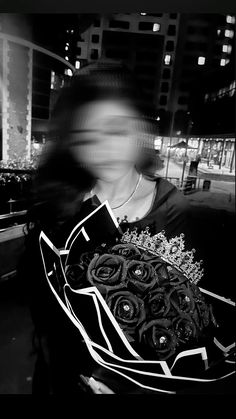 a blurry photo of a woman holding a bouquet