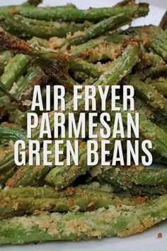 air fryer parmesan green beans on a white plate with the words, air fryer parmesan green beans