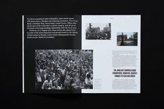 an open book with black and white photos on the cover, in front of a crowd of people