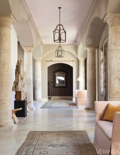 the hallway is clean and ready for guests to use it as an entrance way or sitting area