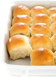 freshly baked rolls in a white baking dish