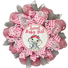 a pink and white wreath with an elephant on it's head, says sweet baby girl