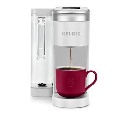 the keurig coffee maker with its red cup