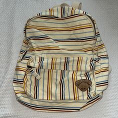 Mini Billabong Backpack, Cream And Colorful Stripped. Never Used, Without Tags Casual Striped Bags With Adjustable Strap, Casual Striped Shoulder Bag With Adjustable Strap, Casual Multicolor Satchel Backpack, Casual Bags For On-the-go And Back To School, Casual Bags For Back To School, Casual On-the-go Bags For Back To School, Casual Striped Canvas Bag, Beachy Backpack, School Backpacks Highschool