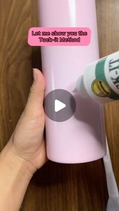 a person is holding a pink cup with the words let me show you the truth behind it