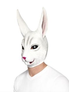 a man wearing a white bunny mask with pink nose