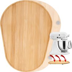 a wooden cutting board with an electric mixer on it