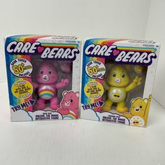 two toy bears are in the same box