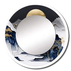 a round mirror sitting on top of a table