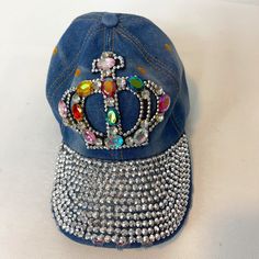 This Hat Is Meant For The Queen In You... And Your Not Afraid To Flaunt It! All The Stones Are In Tack And This Cap Is In Euc This Would Also Make A Great Gf Gift. This Hat Could Be A Cutom Piece Denim Snapback Baseball Cap For Spring, Blue Denim Visor Hat, Spring Blue Denim Baseball Cap, Denim Visor Hat, One Size Fits Most, Denim Visor Hat One Size, Denim Visor Hat One Size Fits Most, Denim Visor Hat, Denim Snapback Hat One Size, Denim Snapback Hat One Size Fits Most