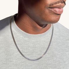 Create the ultimate look with our Men's Silver Cuban Link Necklace. Featuring a sleek design, this stunning chain will add effortless style to any outfit. Made from hypoallergenic stainless steel and hand-crafted, this exquisite necklace is a sophisticated piece to add to your collection. ✔Hypoallergenic ✔Quality Guaranteed ✔Water Resistant ✔ Lifetime Warranty Against Rust And Tarnishing MATERIAL: stainless steel LENGTH: 20 inch COLOR: silver Silver Metal Cuban Link Necklace, Stainless Steel Cuban Link Necklace With Silver Chain, Silver Stainless Steel Cuban Link Necklace, Silver Cuban Link Metal Necklace, Silver Cuban Link Necklace For Streetwear, Cuban Link Necklace, Cuban Link, Cuban Chain, Silver Chain Necklace