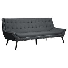 a gray couch with black legs and buttons on the armrests, sitting against a white background